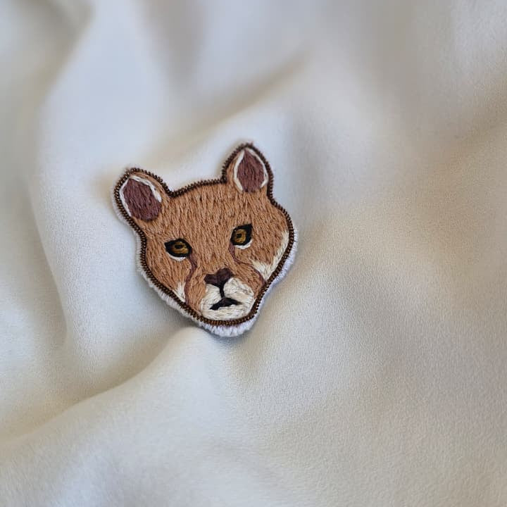 Prendedor Puma