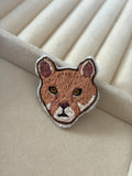 Prendedor Puma