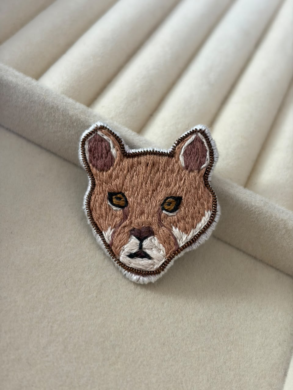 Prendedor Puma